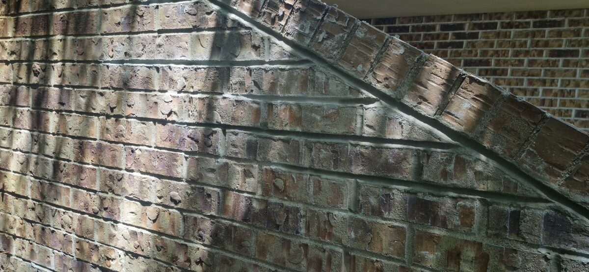 Repointed antique brick wall after tuckpointing in Omaha, second angle